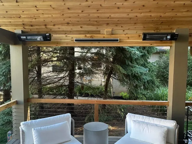 Covered patio seating beneath wood ceiling