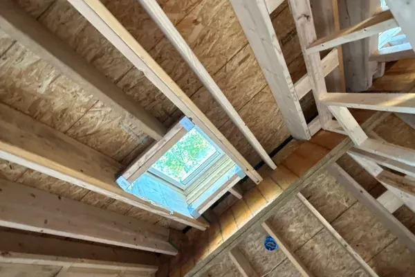 Roof framing and skylight in progress