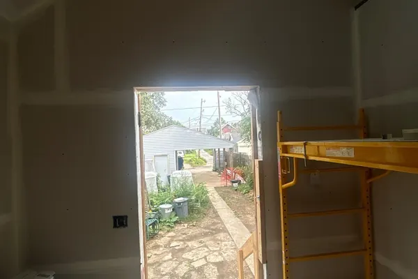 Interior drywall and taping in progress